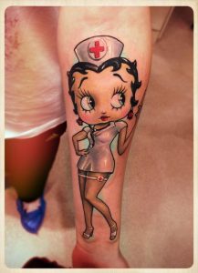 Betty-Boop-Nurse-Tattoo-On-Left-Arm