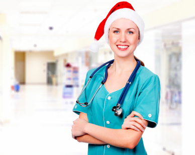 doctor wearing Santa hat in a hall of a hospital